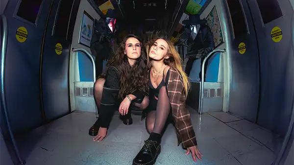 NEONI sisters in subway car